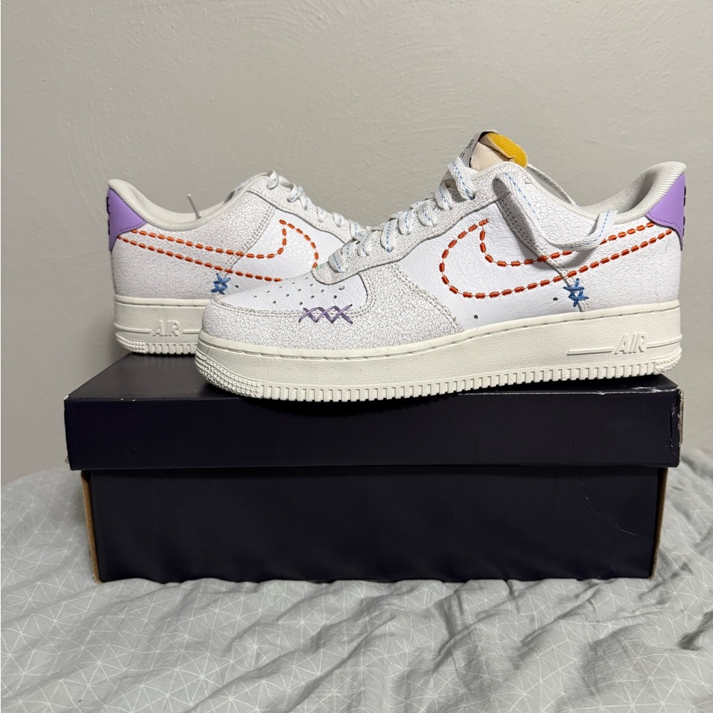 Nike Air Force White Sneakers with Orange and Purple Accents